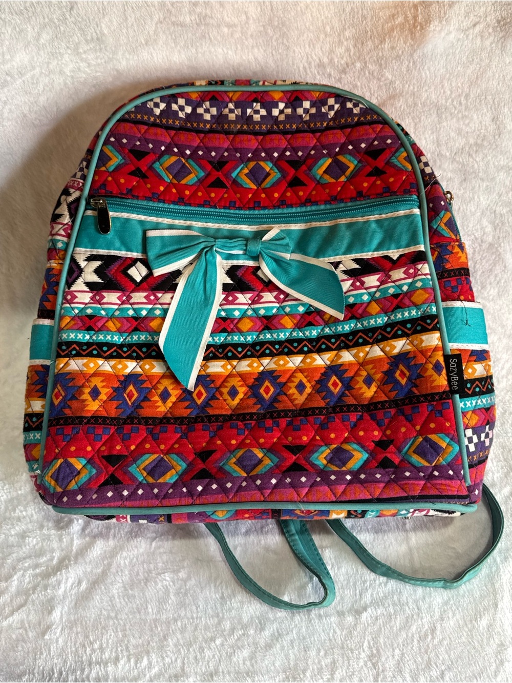 Colorful Aztec Pattern Backpack with Teal Bow Accent